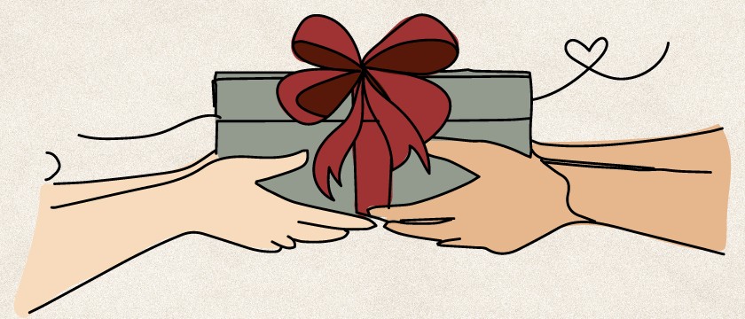 Two hands passing a gift wrapped with a red bow